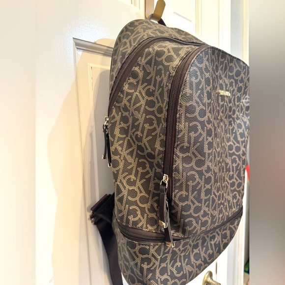 Calvin Klein Monogrammed Brown Backpack